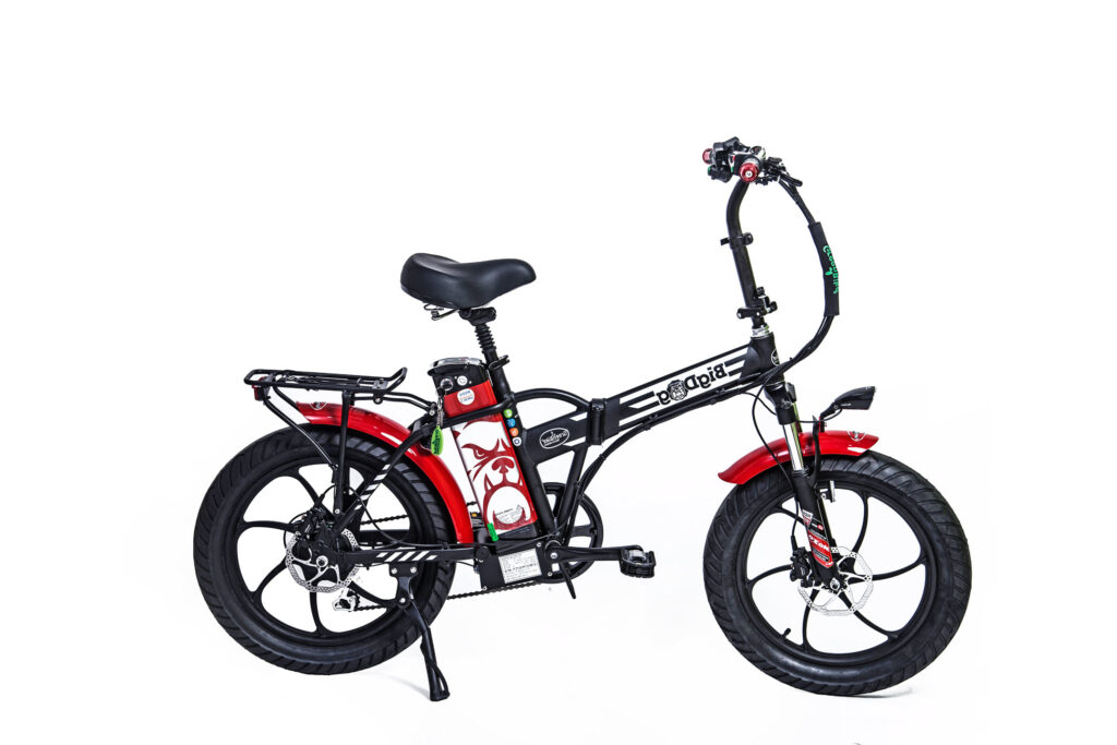 אופניים חשמליים מתקפלים בצבעים אדום ושחור, המיועדים לשימוש עירוני ותחזוקה קלה.